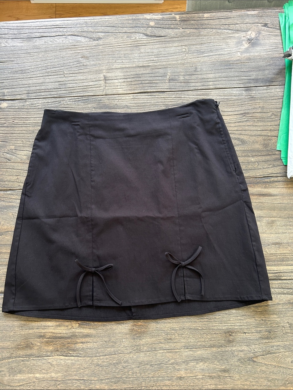 Torrid Black Mini Skirt with Front Bow Accents
